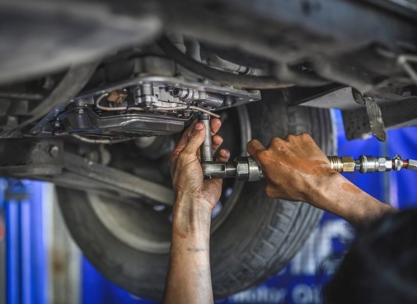 Close-up of tyre tread depth being measured with a gauge at Auto Car Repair Dubai