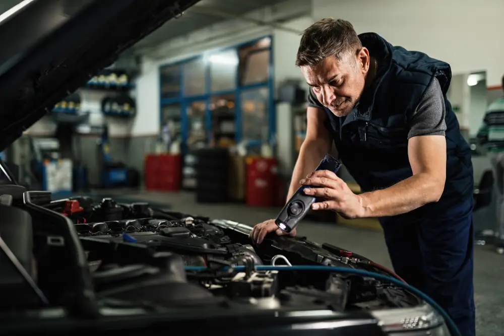 Auto body repair technician at work